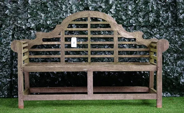 A teak Lutyens style garden bench, 165cm wide x 105cm high.