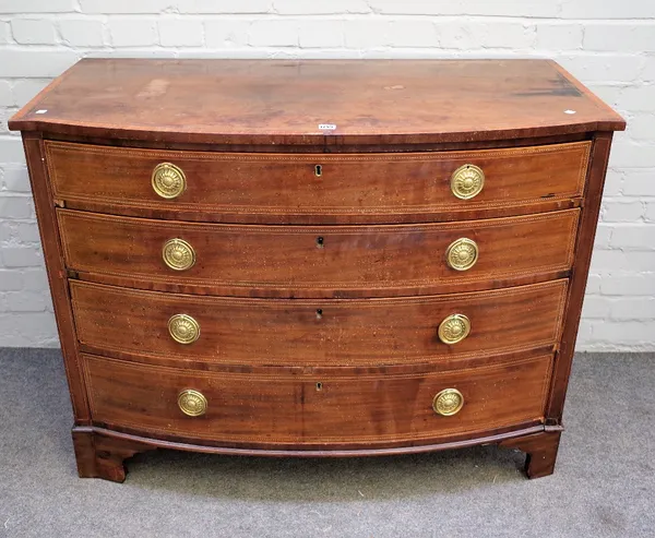 A George III inlaid mahogany bowfront chest of four long graduated drawers on bracket feet, 118cm wide x 88cm high.