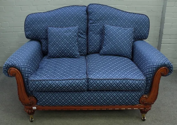 A modern Regency style two seat sofa, with pattern blue diamond upholstery, 155cm wide x 94cm high.