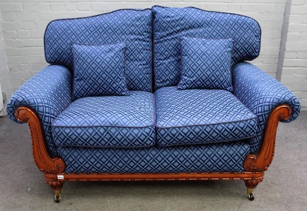 A modern Regency style two seat sofa with pattern blue diamond upholstery, 155cm wide x 94cm high.