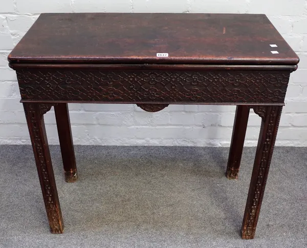 A George III mahogany blind fret carved rectangular fold over tea table, on chamfered square supports, 81cm wide x 73cm high.