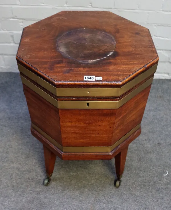 A George III brass bound mahogany octagonal wine cooler on tapering square supports, 50cm wide x 59cm high.