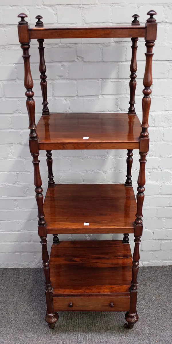 A Victorian rosewood four tier whatnot with single drawer base, on turned supports, 42cm wide x 141cm high.