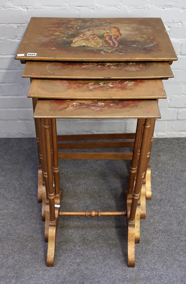 A nest of four quartetto tables, late 19th century, polychrome painted, with figure and landscape scenes, against a gilded ground on dual turned end s