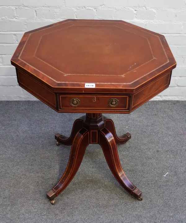 A George III style inlaid mahogany octagonal centre table with a pair of frieze drawers on four downswept supports, 61cm wide x 71cm high.