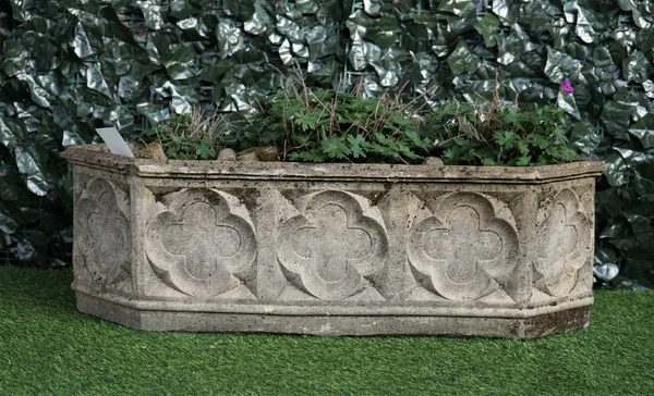 A reconstituted stone Gothic Revival garden planter, of pointed rectangular form, 88cm wide x 28cm high.