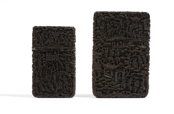 Two Chinese export tortoiseshell rectangular card cases, 19th century, each carved with figures amongst pavilions and trees, 9.5cm and 11.5cm high, (2