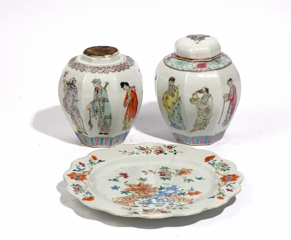 Two Chinese famille- rose octagonal jars and a cover, late 19th/early 20th century, each similarly painted with the Eight Immortals beneath a differin