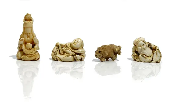 A group of three Japanese ivory netsuke, Meiji period, comprising; a netsuke of Fukurokuju, seated with a child and with a toad on his head, unsigned,