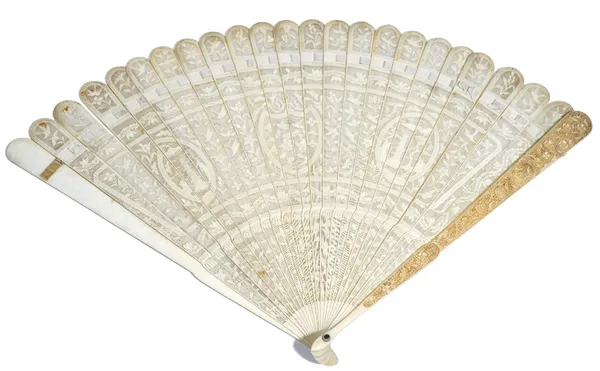 A Chinese ivory brisé fan, 19th century, carved and pierced with pagodas, birds and flowers, the guard sticks carved with birds amongst flowering bran