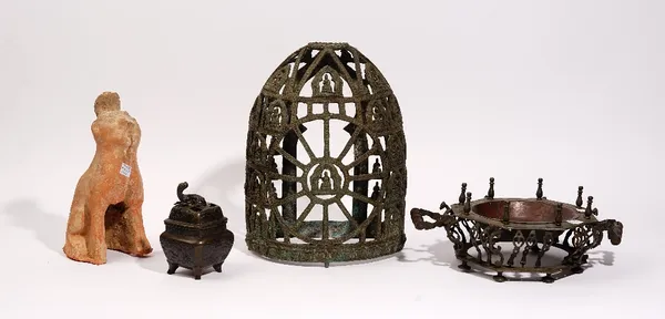 A group of Asian metalwares, various dates. comprising; a South East Asian bronze openwork cover, possibly Java, cast with buddhas inside niches, 32cm