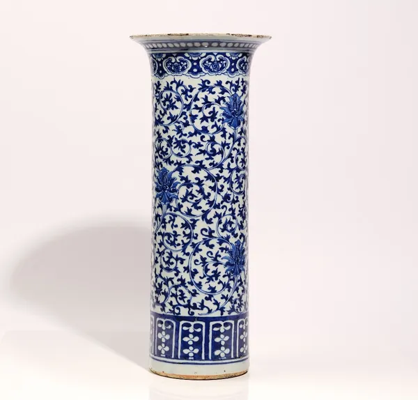 Chinese tall blue and white beaker vase, late 19th century, painted with lotus flowers and tendrils, 46cm. high.