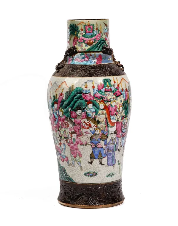 A tall Chinese crackle glazed baluster vase, late 19th century, painted in famille-rose enamels with a procession of figures, the shoulders applied wi