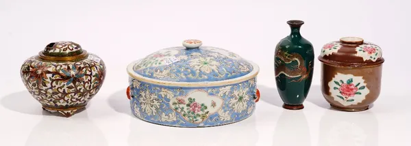 A Chinese small café au lait ground bowl and cover, 18th/19th century, reserved with leaf shaped panels enclosing flowers, 10cm. high; also a Chinese