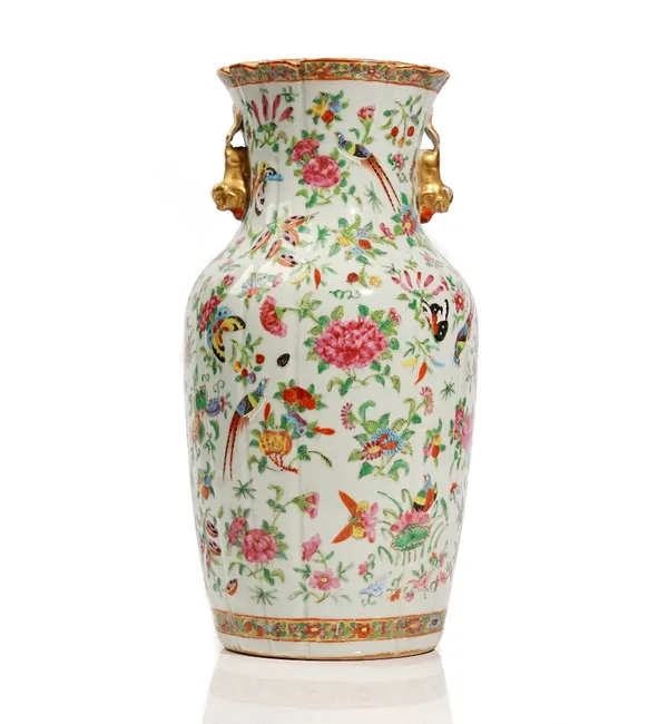 A Canton famille-rose vase, 19th century, painted with birds, insects, flowers and fruit, 35.5cm.high.