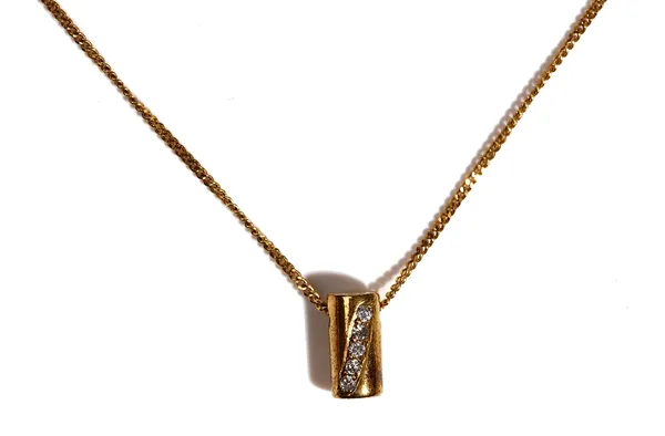 A 9ct gold and diamond set pendant, of cylindrical form, mounted with a row of five circular cut diamonds, in a slanting design, on a 9ct gold curb li