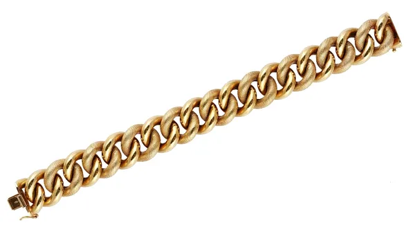 A gold bracelet, in an alternating decorated and plain hollow large curb link design, on a snap clasp, detailed 18 KT ITALY 750, length 19cm, gross we