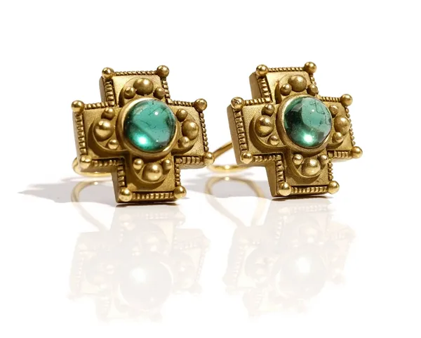 A pair of American gold and cabochon green tourmaline earclips, each in a cruciform design with beaded decoration, otherwise having a textured finish,