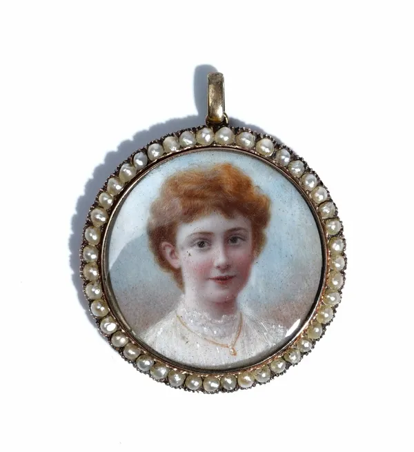 A gold and seed pearl set circular pendant locket, circa 1910, glazed with a portrait miniature of a lady within a surround of seed pearls, the back g