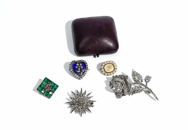 A blue enamelled and colourless paste set brooch, designed as a heart with a flower spray motif, a brooch glazed with a central hair locket compartmen