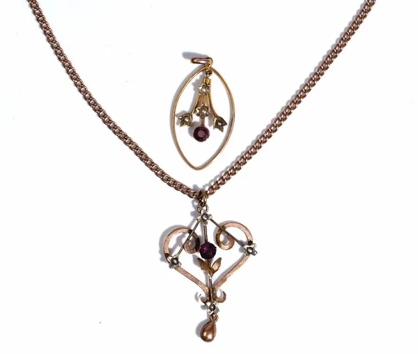 A gold, seed pearl and mauve paste set pendant detailed 9ct, on a gold curblink neckchain detailed 9, with a cylindrical clasp and a gold, garnet and