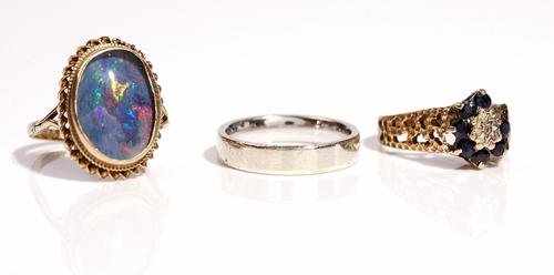 A 9ct white gold plain wedding ring, ring size M, weight 4.1gms, a 9ct gold, sapphire and diamond set cluster ring, (one sapphire lacking) ring size N