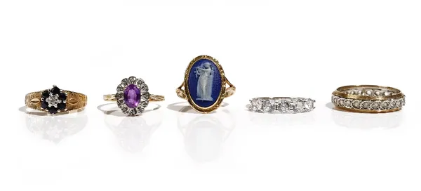 A 9ct gold, sapphire and diamond set seven stone cluster ring, a 9ct gold, amethyst and diamond set oval cluster ring, a gold mounted Wedgwood cameo r