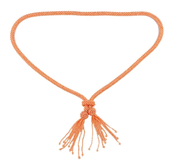 A coral bead sautoir necklace the front with two pendant tassel drops, gross weight 125gms, with a box. Provenance: from the estate of the late Jessye