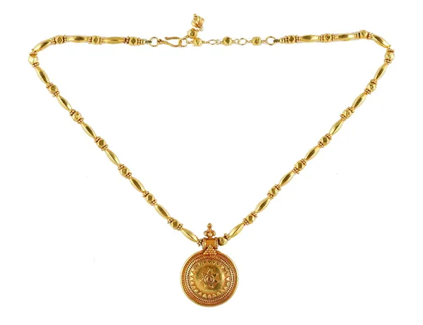 An Asian gold pendant necklace, the circular pendant decorated with a beaded border, on a faceted and beaded link neckchain, with a hook shaped clasp,