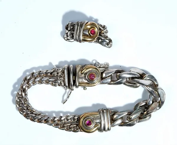 A Gucci silver and silver gilt bracelet and ring suite, the bracelet set with a ruby cabochon link to a heavy flattened curb link bracelet to one side