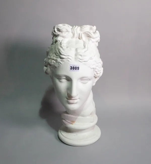 A modern white plaster bust formed as a classical female, 49cm tall.