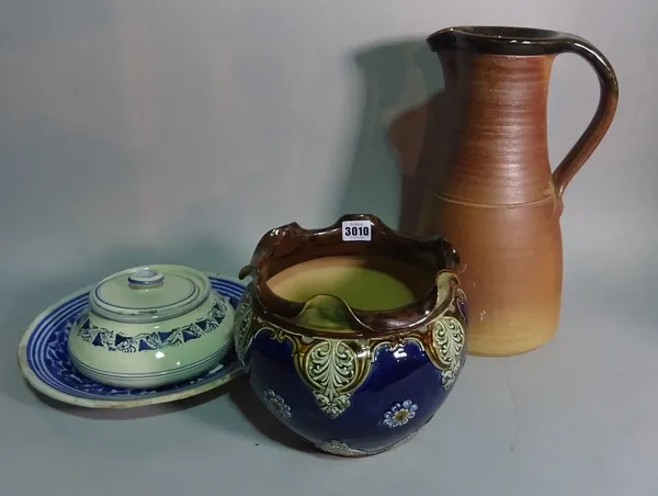 A Doulton jardinèire with blue glaze, 21cm high, a brown glaze studio pottery jug, 38cm high and a modern blue and white bowl and cover (3).