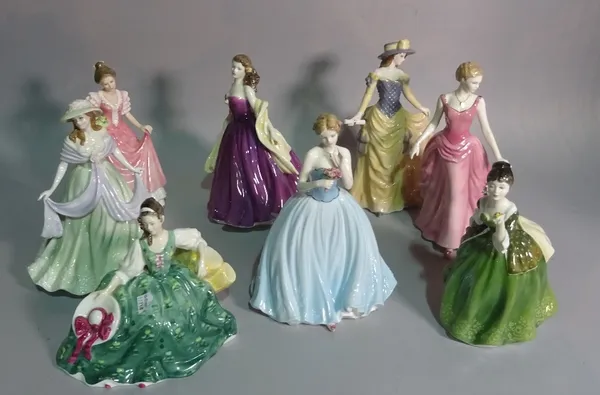 A group of eight Royal Doulton figurines, the largest 23cm high (8).