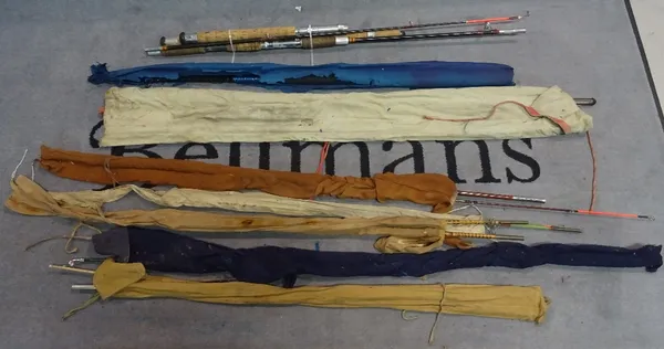 A quantity of assorted 20th century fishing rods.