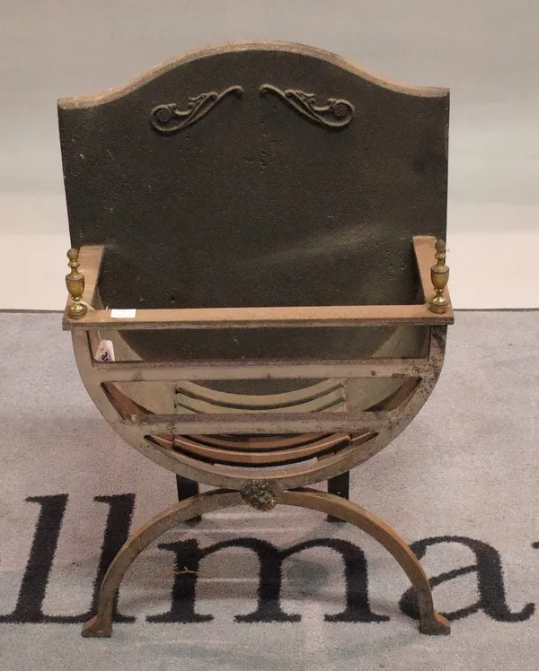 A cast iron bowfront fire basket with brass finials, 38cm wide.