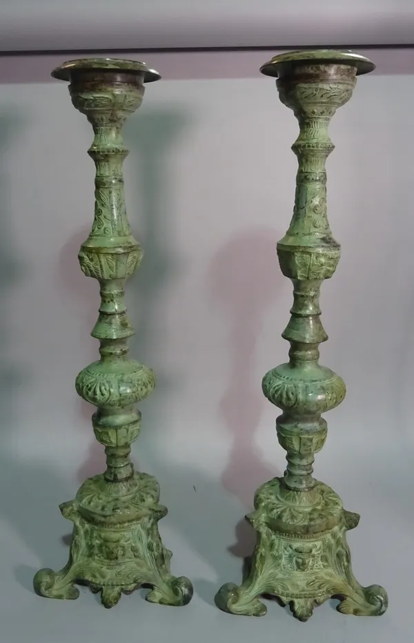 A pair of modern bronze effect candlesticks, 60cm high (2)