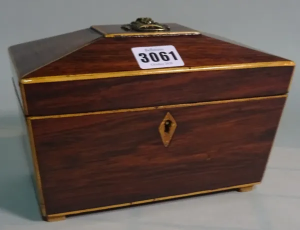 An early 20th century rosewood inlaid tea caddy of sarcophagus form, 20cm wide x 21cm high