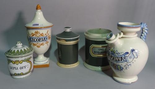 A group of five early 20th century ceramic apothecary jars and a European ceramic ewer, 26cm high (6).