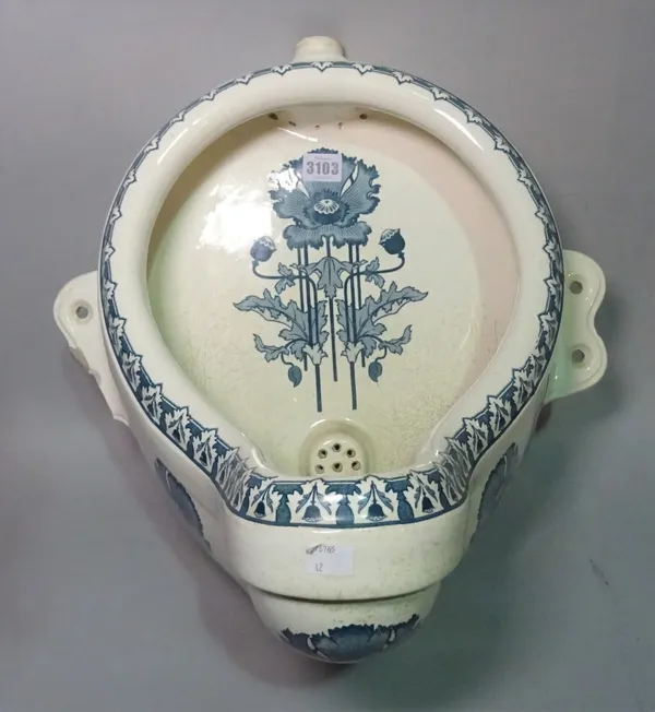 A Victorian style urinal with printed floral pattern, 46cm. high.