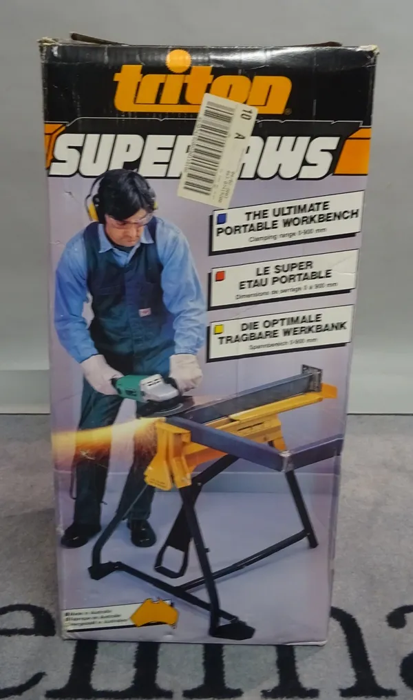 A Triton Super Jaws portable work bench (boxed).