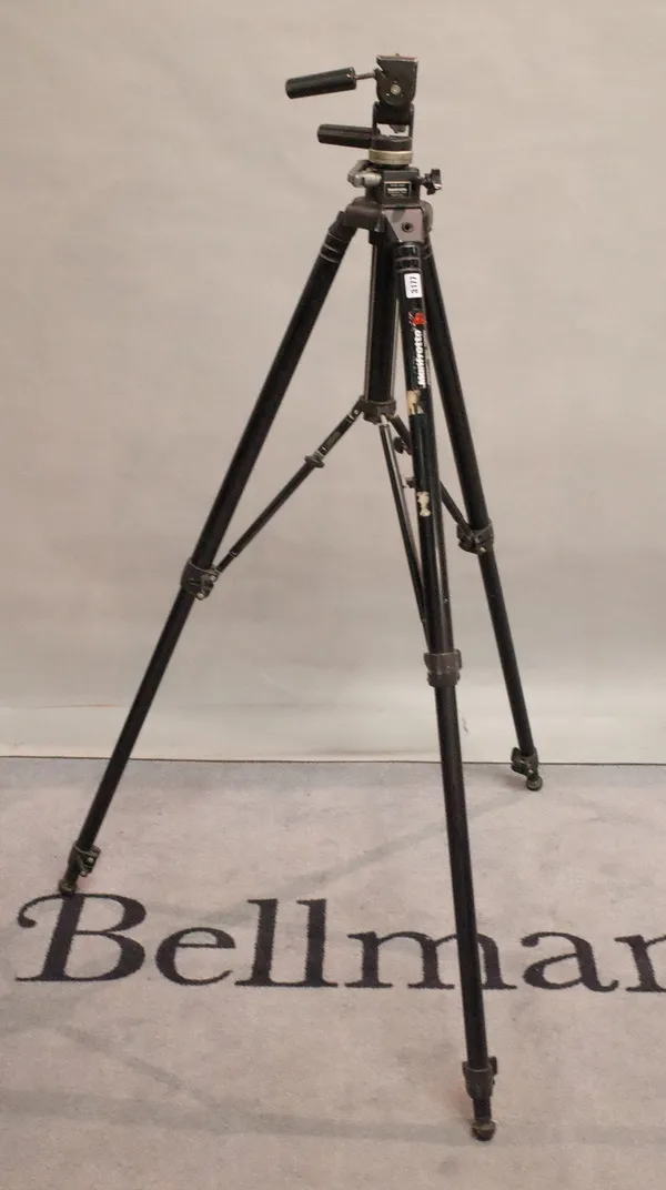 A mid 20th century ManFrotto professional camera tripod, 96cm tall.