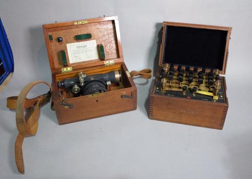A Manganin coils resistance box early 20th century and a Stanley surveyor's level, both cased.
