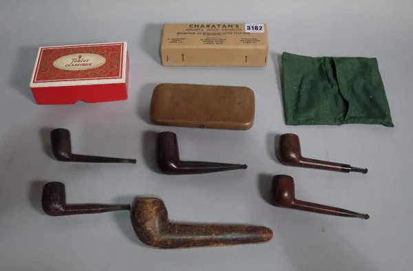 A quantity of early 20th century wooden smoking pipes including a silver mounted Bakelite example (qty).