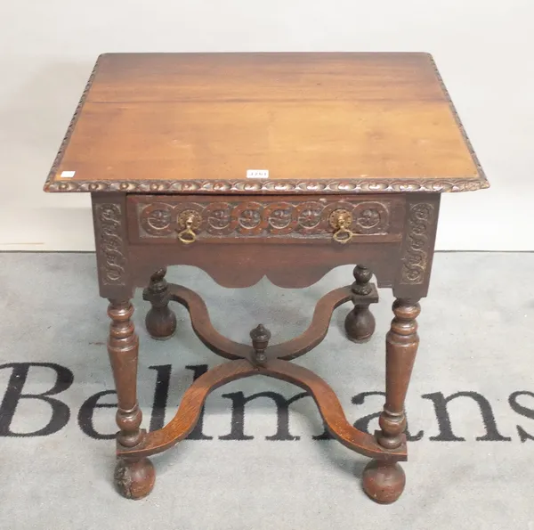 An 18th century continental oak single drawer side table on X frame stretcher, 68cm wide x 70cm high.