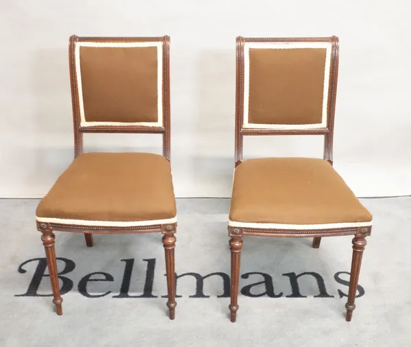 A pair of Louis XVI style side chairs on fluted supports, 44cm wide x 83cm high (2).