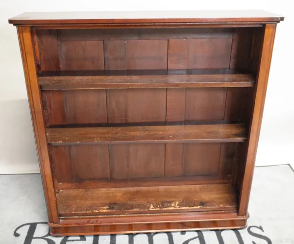 A Victorian mahogany bookcase on bun feet, 103cm wide x 105cm high.