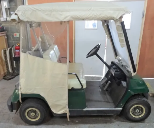 A YAMAHA golf buggy.