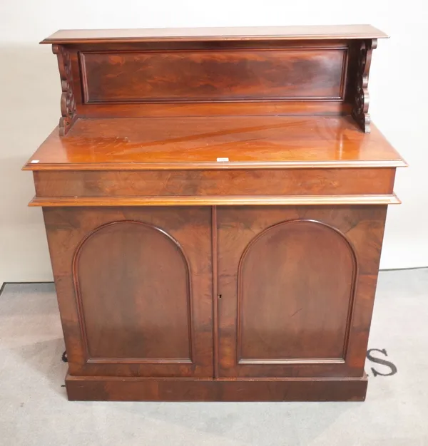 A late Victorian mahogany chiffonier with arch panelled doors on plinth base, 108cm wide x 121cm high.