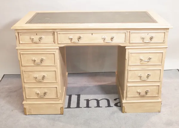 A modern grey painted pedestal desk with inset leather top, 121cm wide x 75cm high.