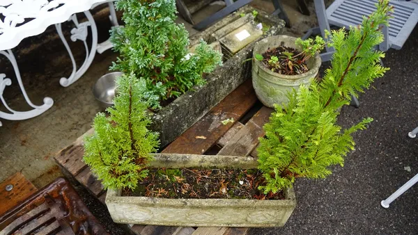 Garden statuary comprising a reconstituted stone rectangular planter 93cm wide x 20cm high, another similar smaller, 63cm wide x 18cm high, two small